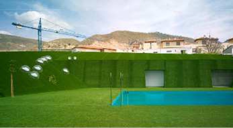 Piscina municipal en un valle artificial en Lobres, Granada