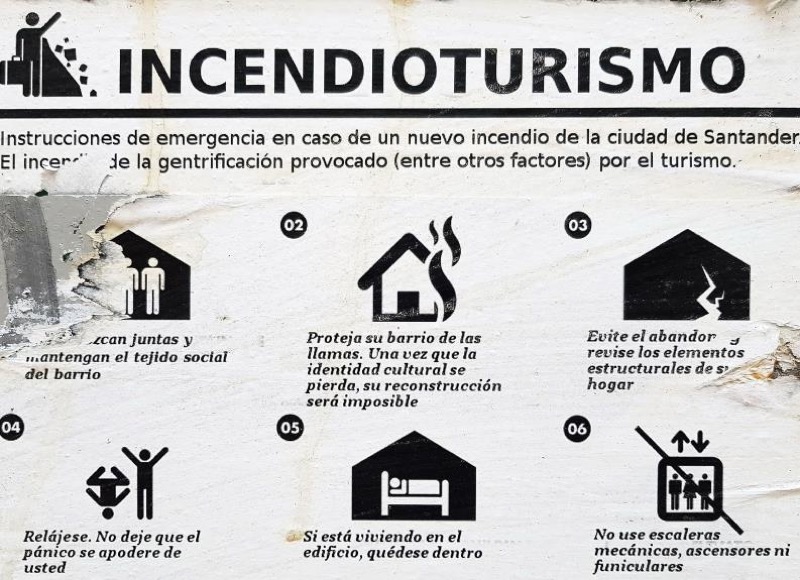 Detalle del cartel Incendioturismo 1941/2017, en calle Salvador Hedilla (diciembre, 2018).